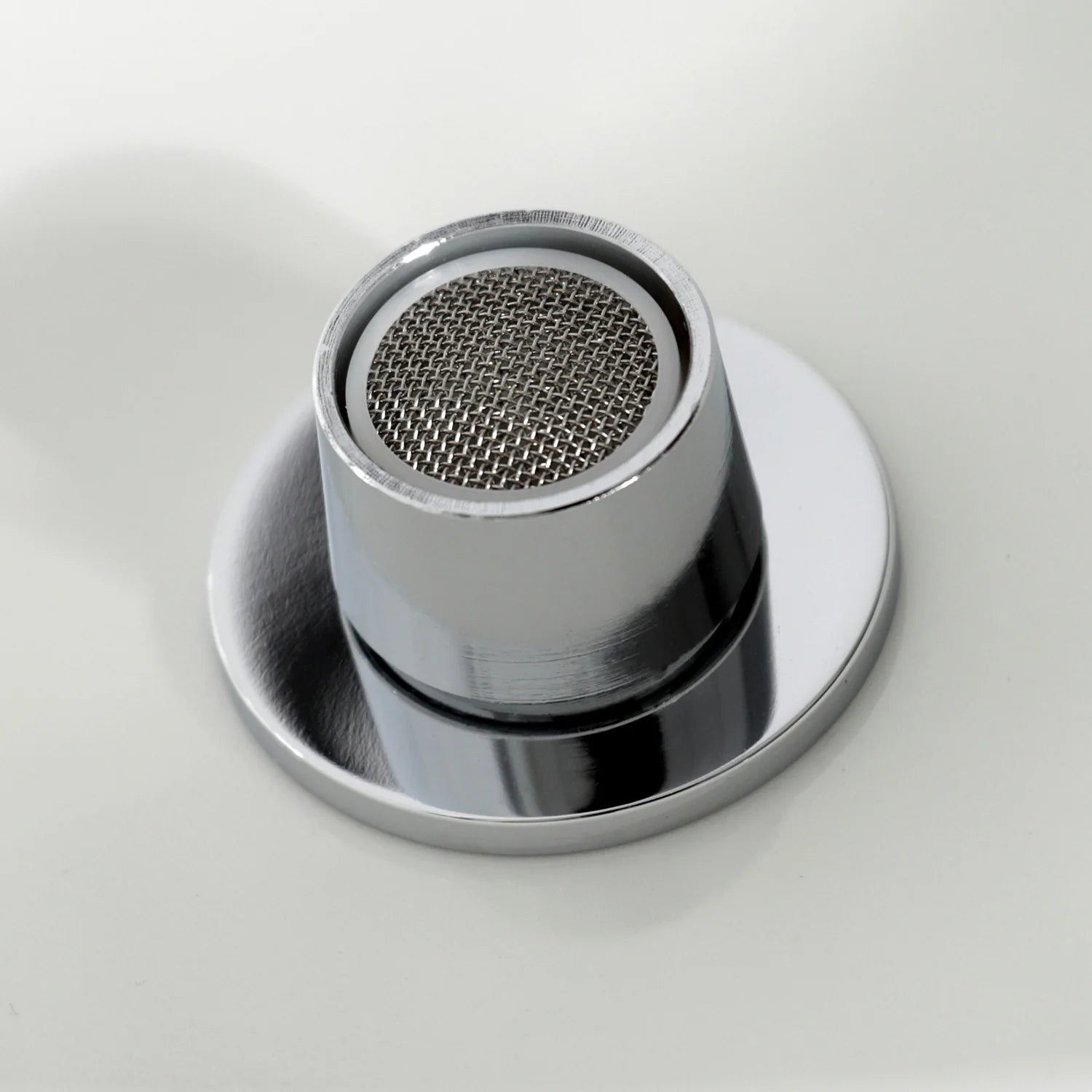 Polished chrome bidet faucet aerator screen and surrounding cap
