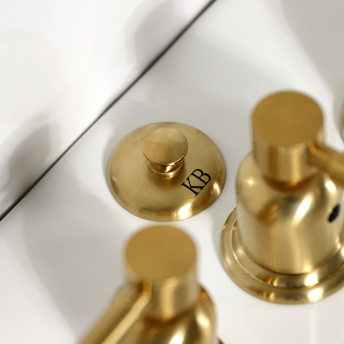 Concord Three-Handle Bidet Faucet with Brass Pop-Up in Brushed Brass