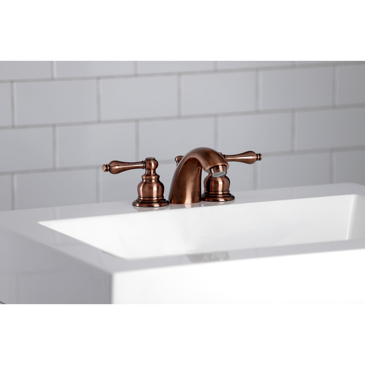 Victorian Mini-Widespread Bathroom Faucet with Pop-Up Drain in Antique Copper