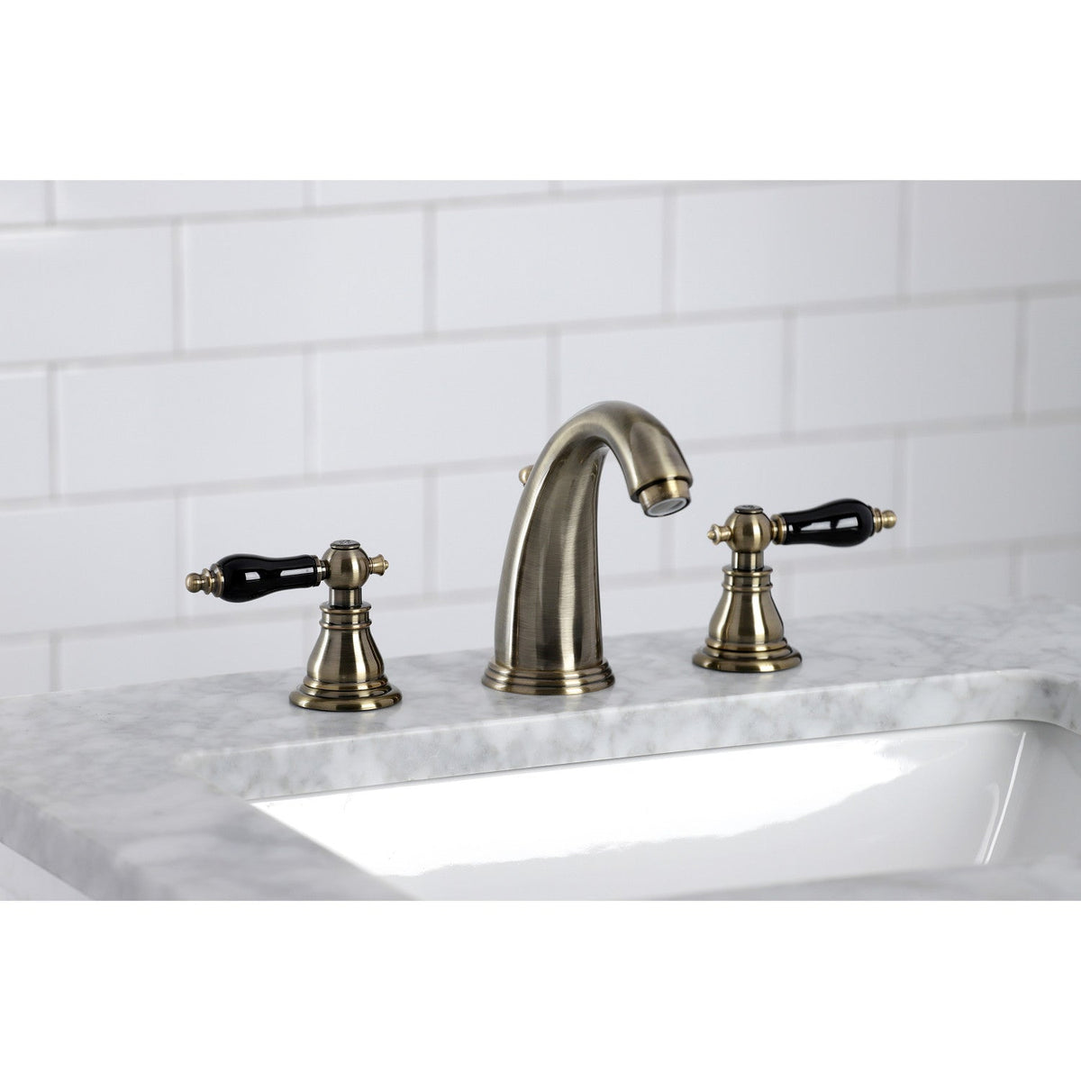 Duchess Widespread Bathroom Faucet with Pop-Up Drain in Antique Brass