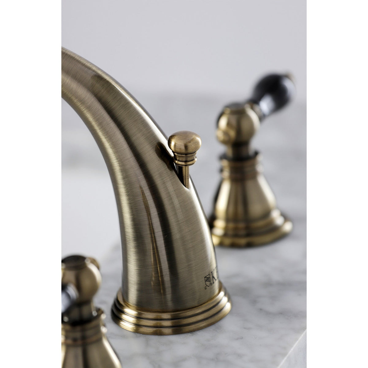 Duchess Widespread Bathroom Faucet with Pop-Up Drain in Antique Brass