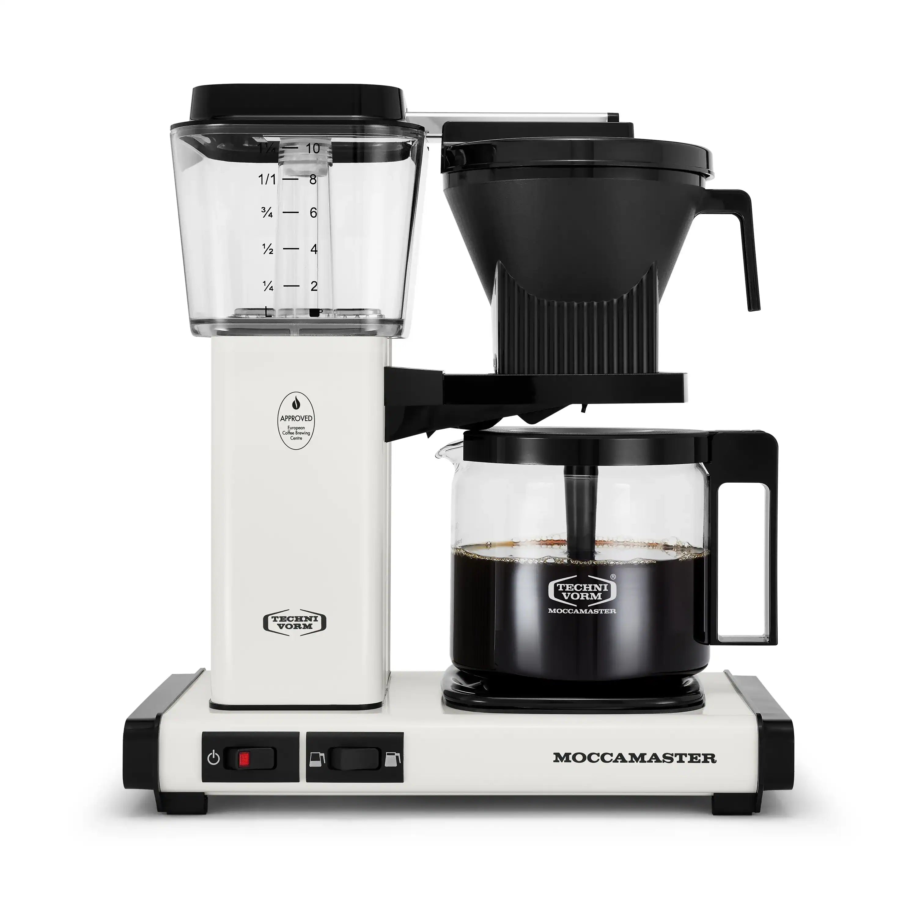 Moccamaster 10-cup coffee maker with off-white base, glass carafe, and black brew funnel