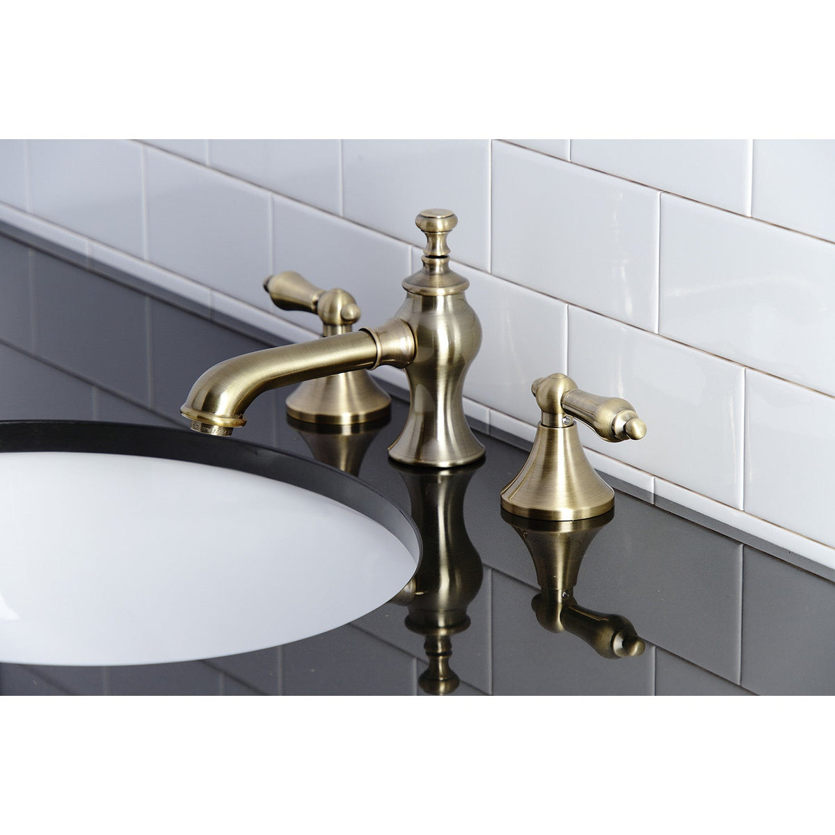 Vintage Widespread Bathroom Faucet with Brass Pop-Up in Antique Brass
