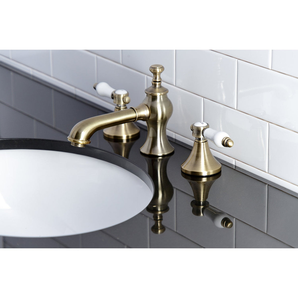 Bel-Air Widespread Bathroom Faucet with Brass Pop-Up in Antique Brass