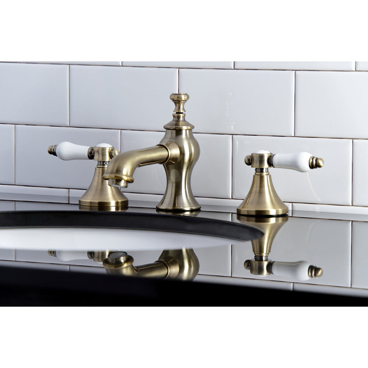 Bel-Air Widespread Bathroom Faucet with Brass Pop-Up in Antique Brass
