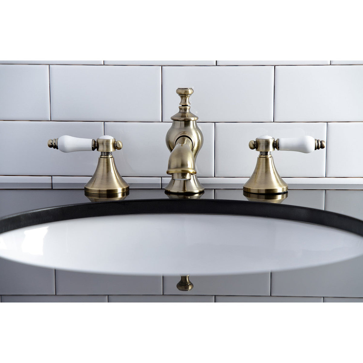 Bel-Air Widespread Bathroom Faucet with Brass Pop-Up in Antique Brass