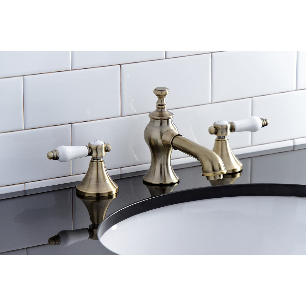 Bel-Air Widespread Bathroom Faucet with Brass Pop-Up in Antique Brass