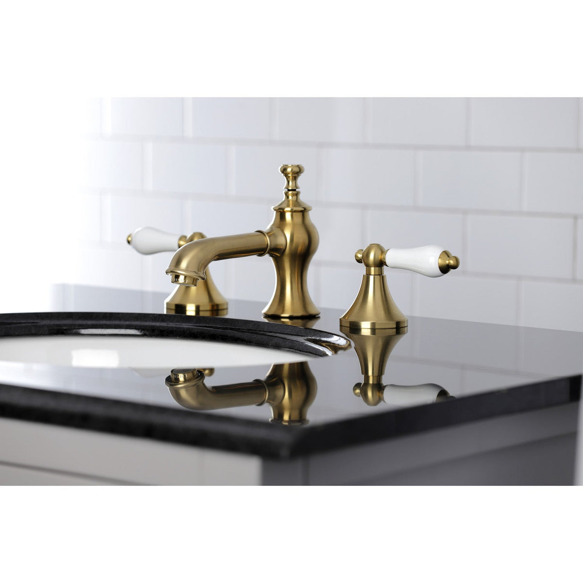 Vintage Widespread Bathroom Faucet with Brass Pop-Up in Brushed Brass