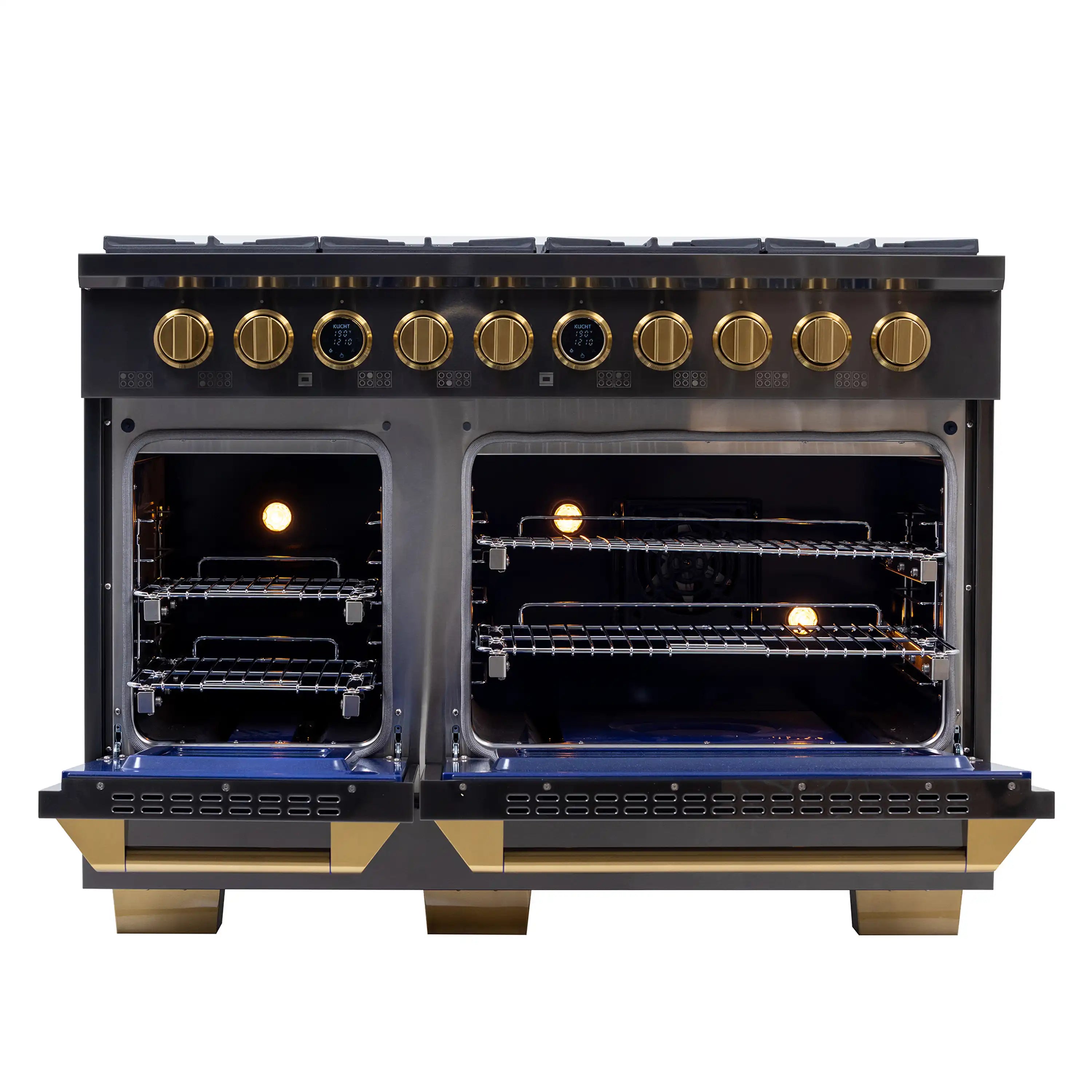 Open dual ovens showing warm interior lights, racks, and gold control knobs on range