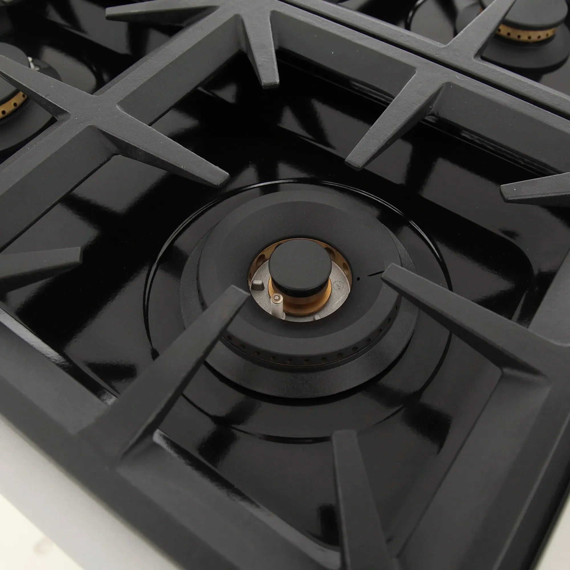 Black propane gas range burner grates with center sealed burner cap