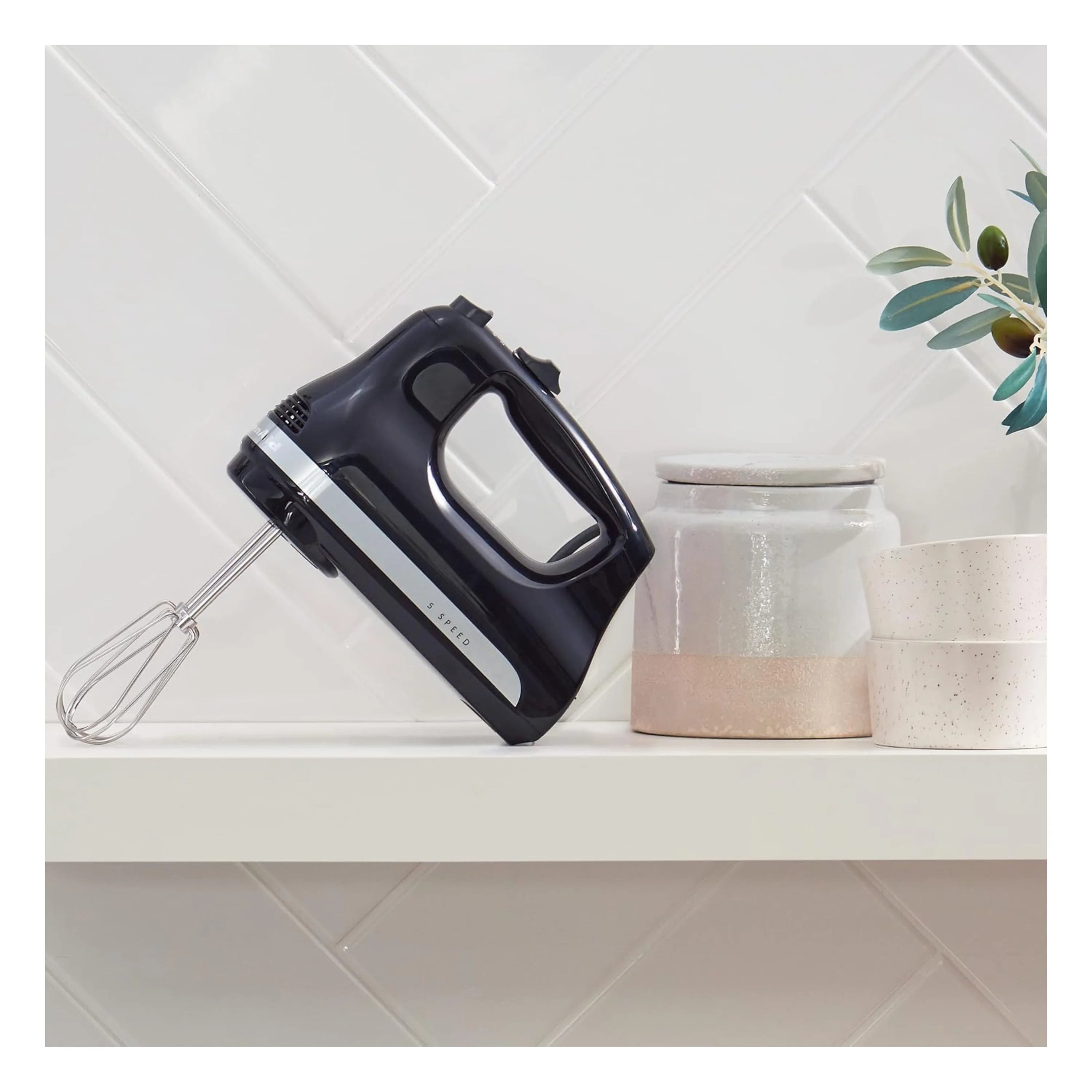 Onyx black KitchenAid 5-speed hand mixer with two wire beaters