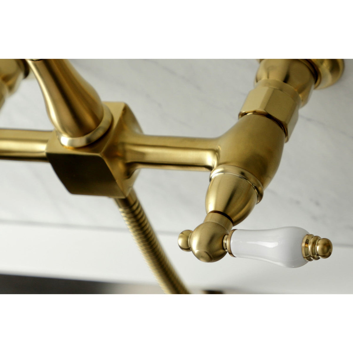 Heritage Double-Handle Wall-Mount Bridge Kitchen Faucet with Brass Sprayer in Brushed Brass