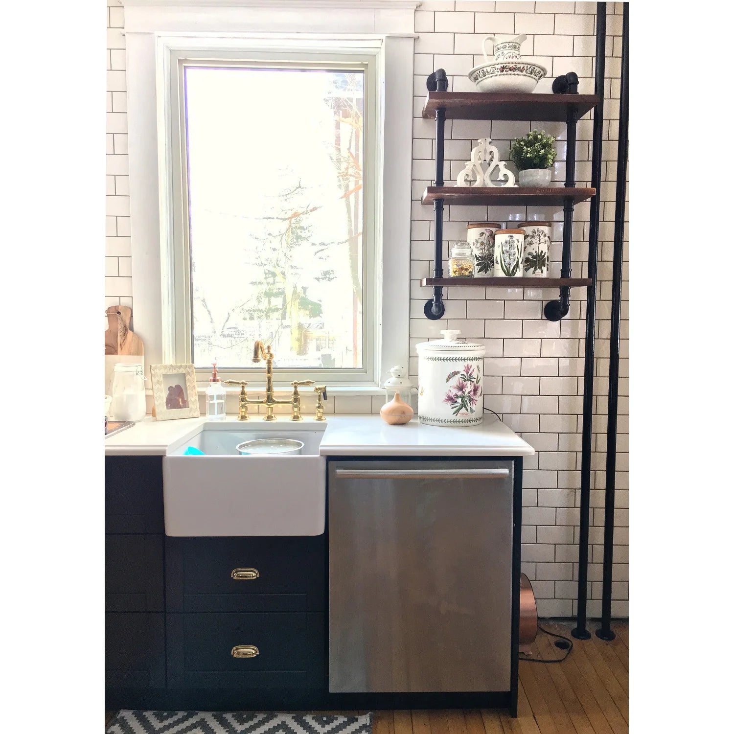 Polished brass bridge kitchen faucet with side sprayer and matching handle set