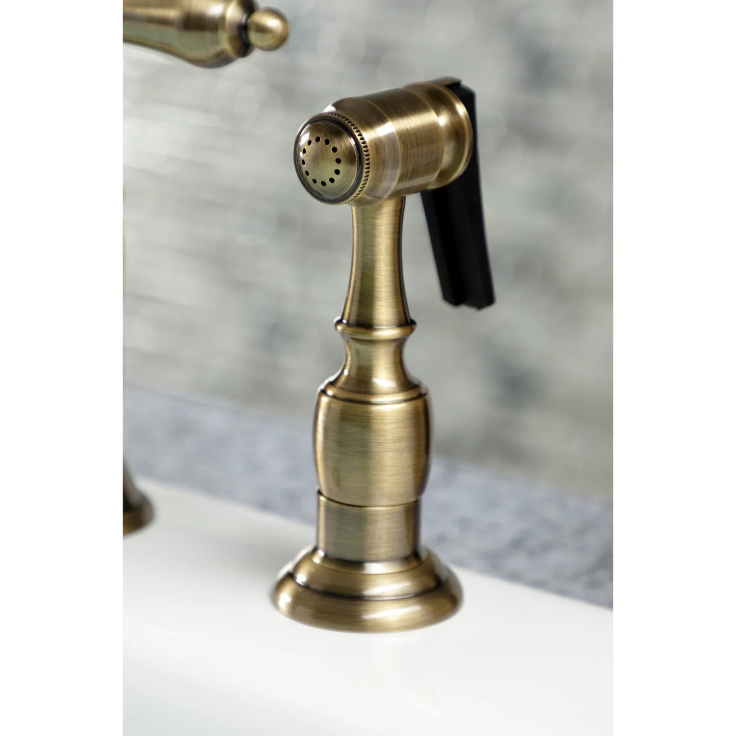 Antique brass side sprayer with perforated spray head and lever handle