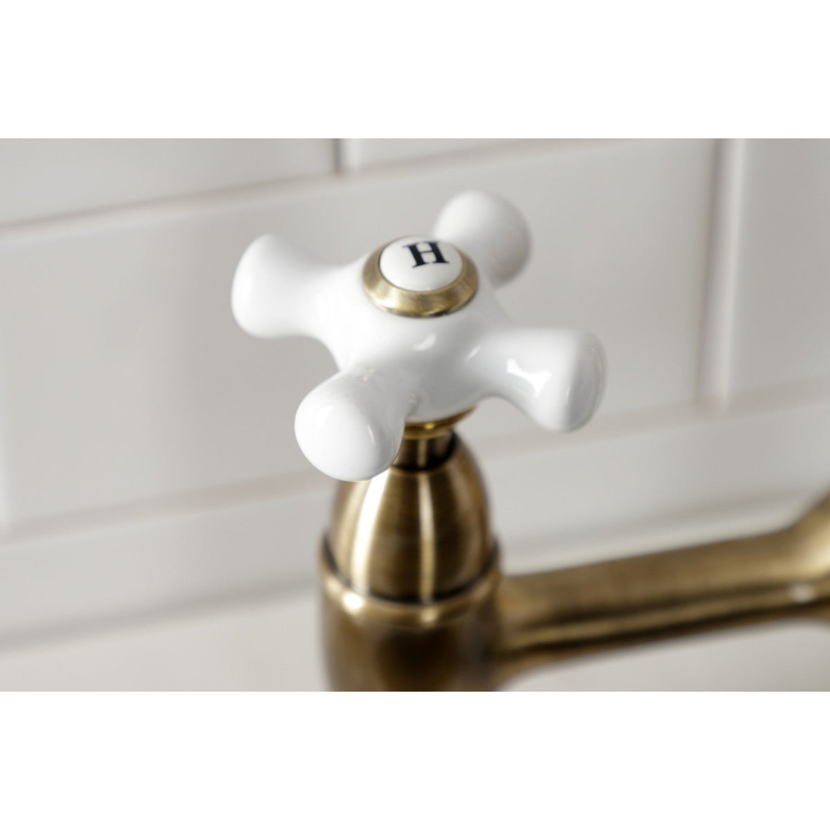 Heritage Bridge Kitchen Faucet with Brass Side Sprayer in Antique Brass