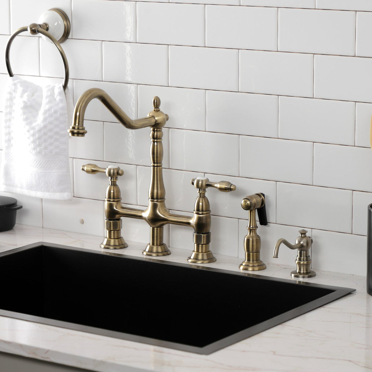 Tudor Bridge Kitchen Faucet with Brass Side Sprayer in Antique Brass
