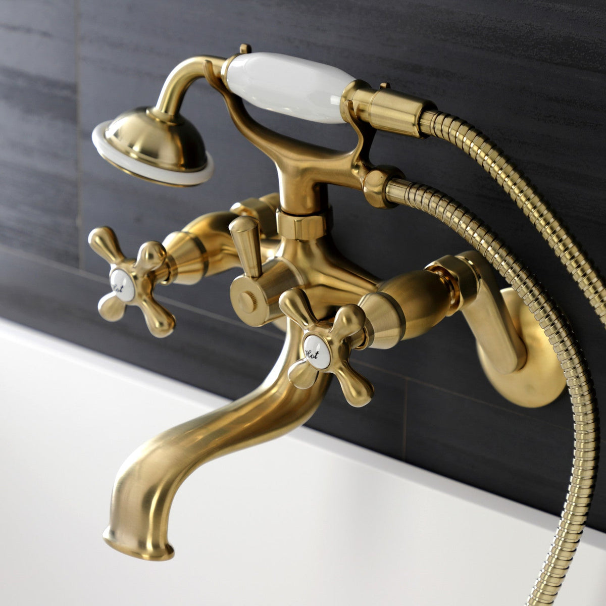 Kingston Wall Mount Tub Faucet with Hand Shower in Brushed Brass