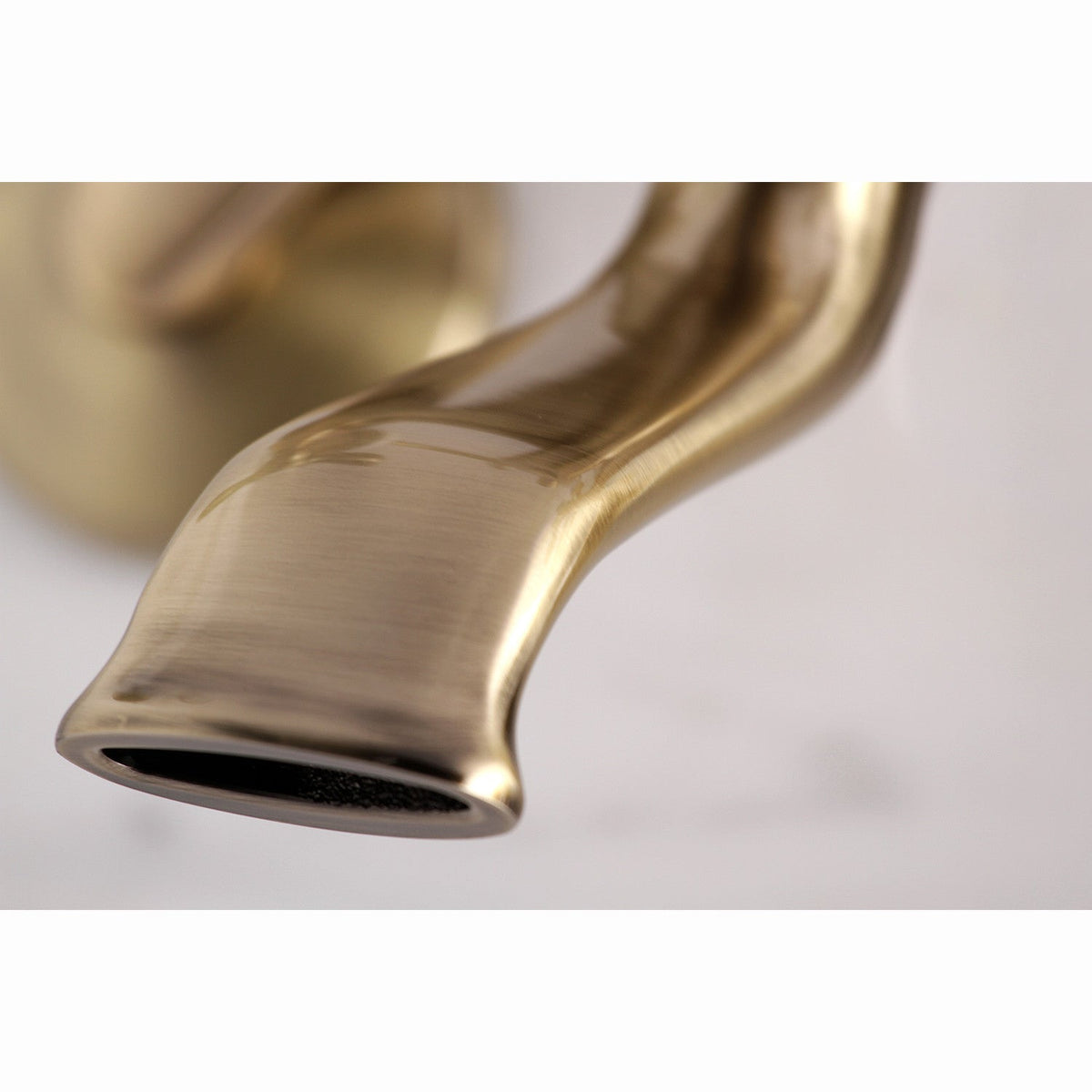Kingston Wall Mount Clawfoot Tub Faucet with Hand Shower in Antique Brass