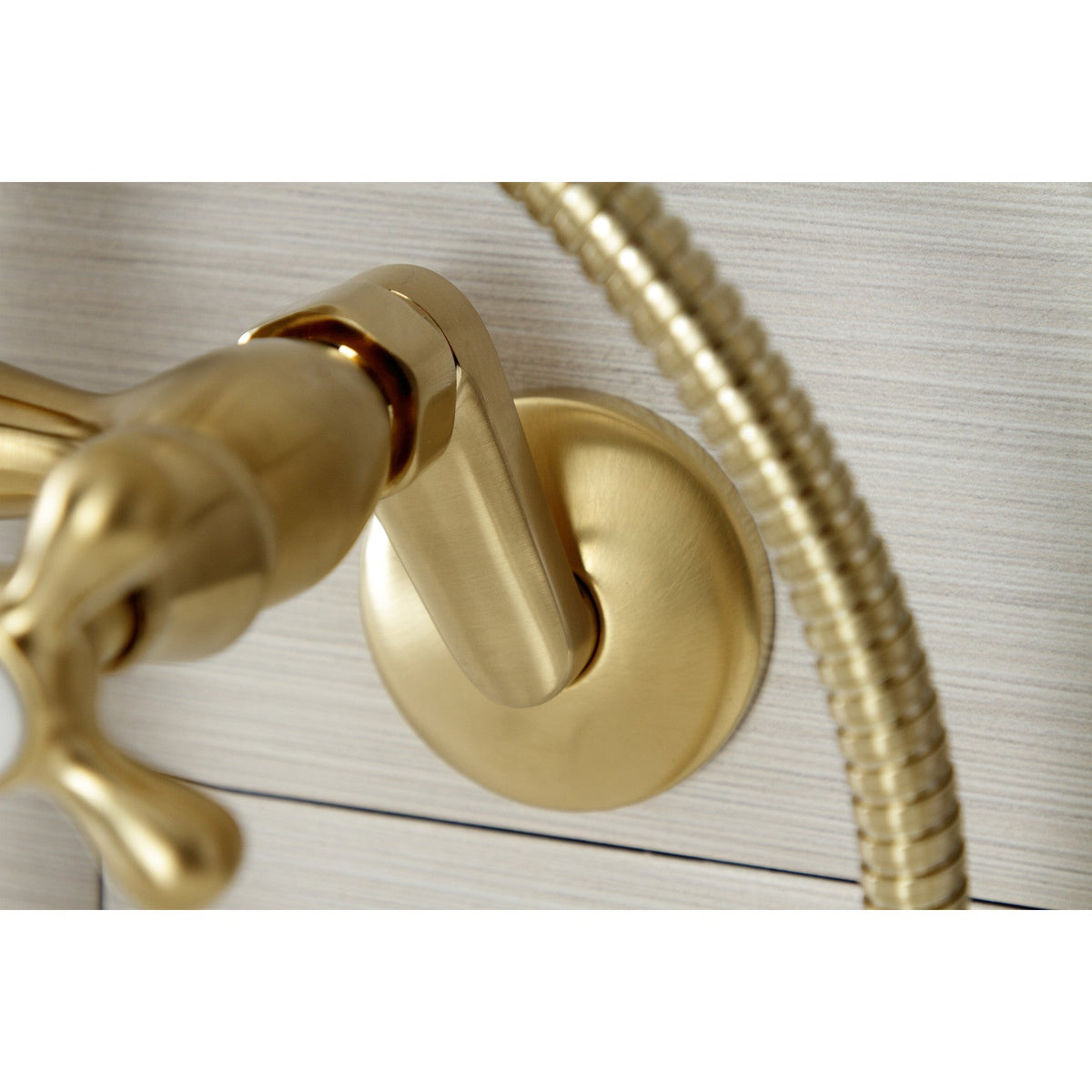 Kingston Wall Mount Clawfoot Tub Faucet with Hand Shower in Brushed Brass