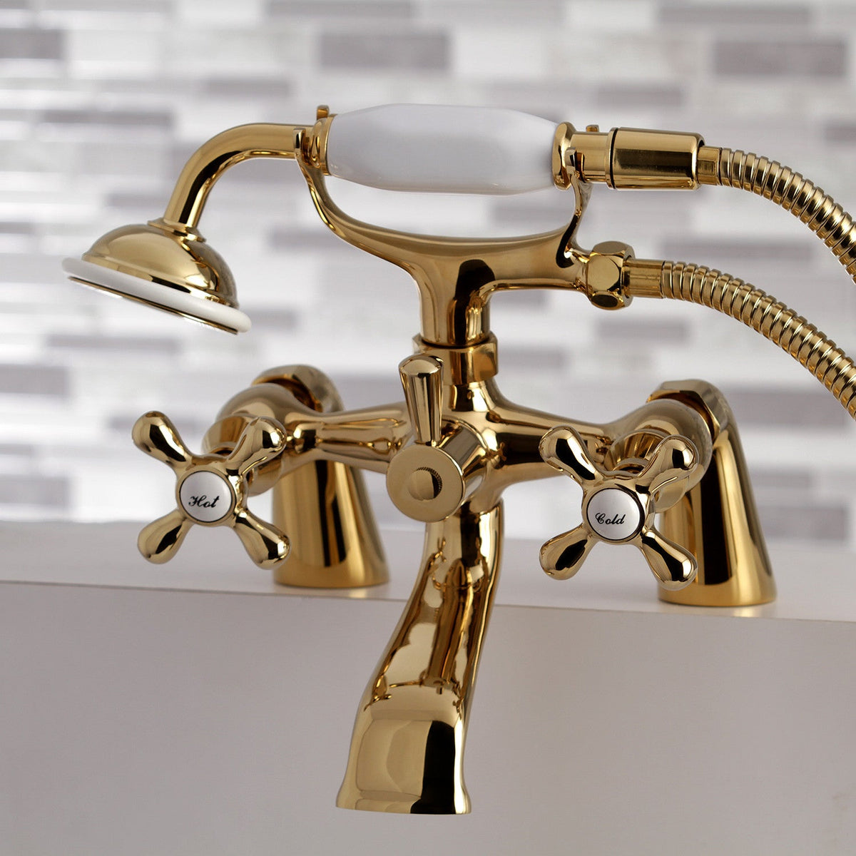 Kingston 6" Center Deck-Mount Clawfoot Tub Faucet with Hand Shower in Polished Brass