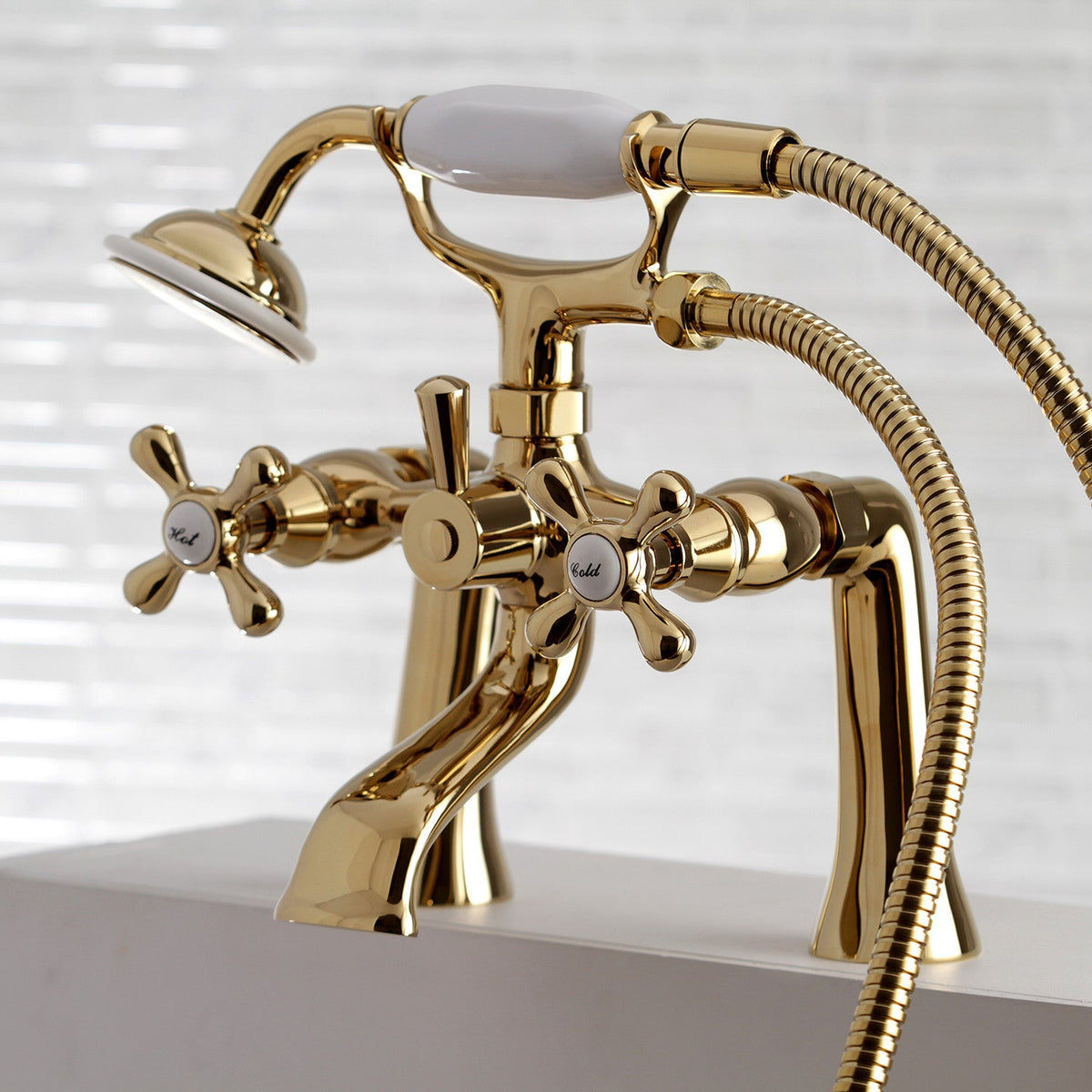 Kingston 7" Center Deck-Mount Clawfoot Tub Faucet with Hand Shower in Polished Brass
