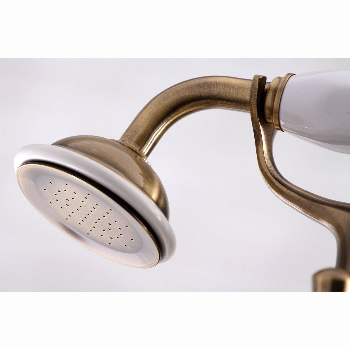 Essex 7" Center Deck-Mount Clawfoot Tub Faucet with Hand Shower in Antique Brass