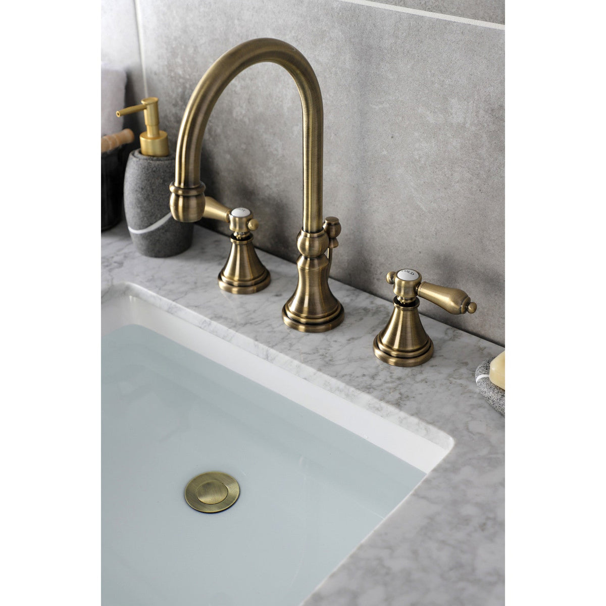 Heirloom Widespread Bathroom Faucet with Brass Pop-Up in Antique Brass