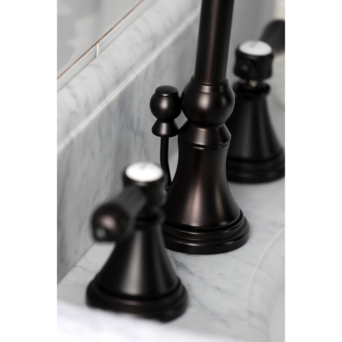 Heirloom Widespread Bathroom Faucet with Brass Pop-Up in Oil Rubbed Bronze