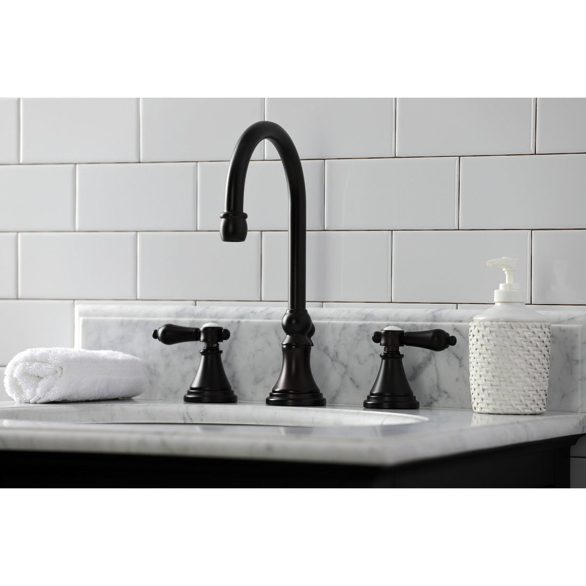 Heirloom Widespread Bathroom Faucet with Brass Pop-Up in Oil Rubbed Bronze