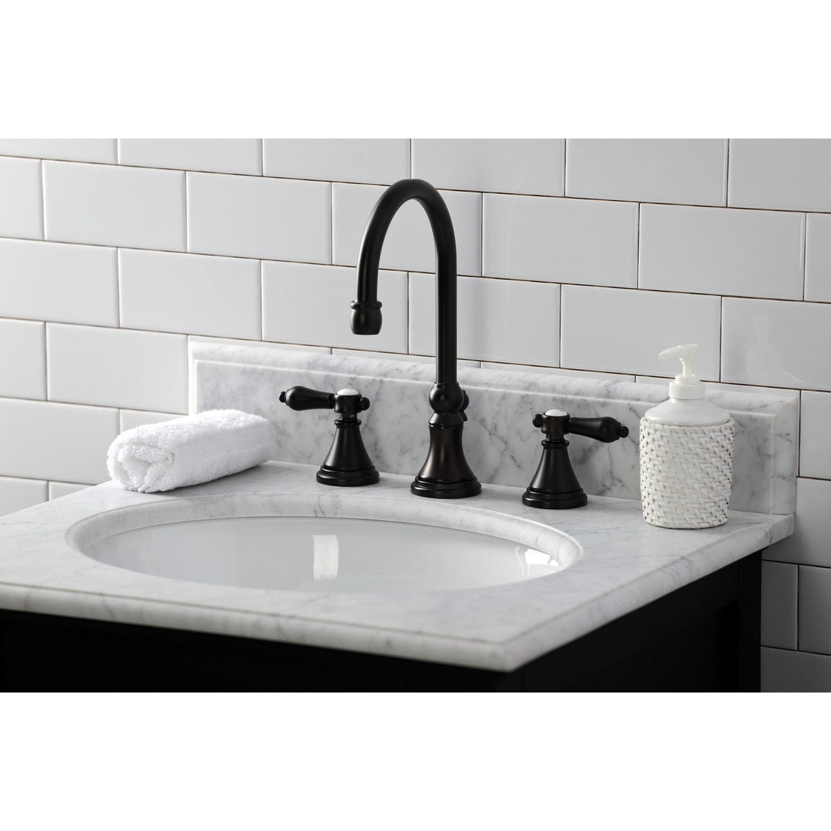 Heirloom Widespread Bathroom Faucet with Brass Pop-Up in Oil Rubbed Bronze