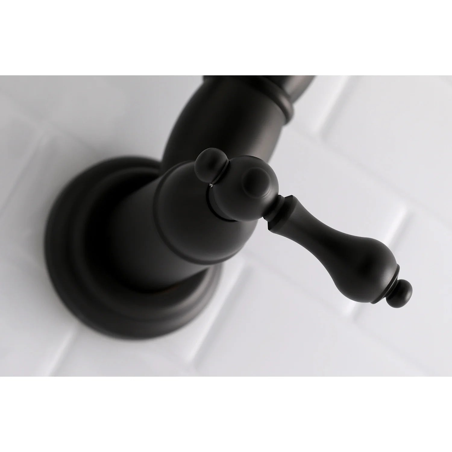 Matte black pot filler faucet handle and spout head on round wall base