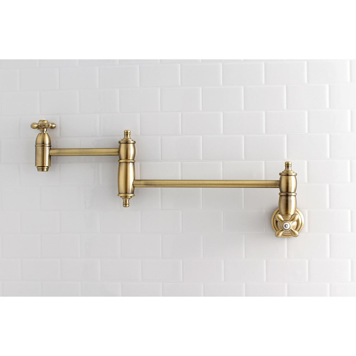 Restoration Wall Mount Pot Filler Faucet in Antique Brass