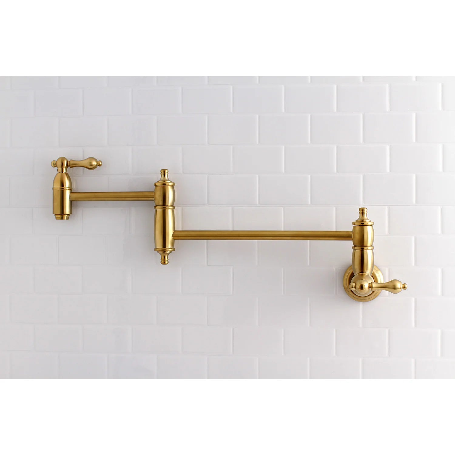 Wall-mounted brushed brass pot filler faucet with two outlets and levers