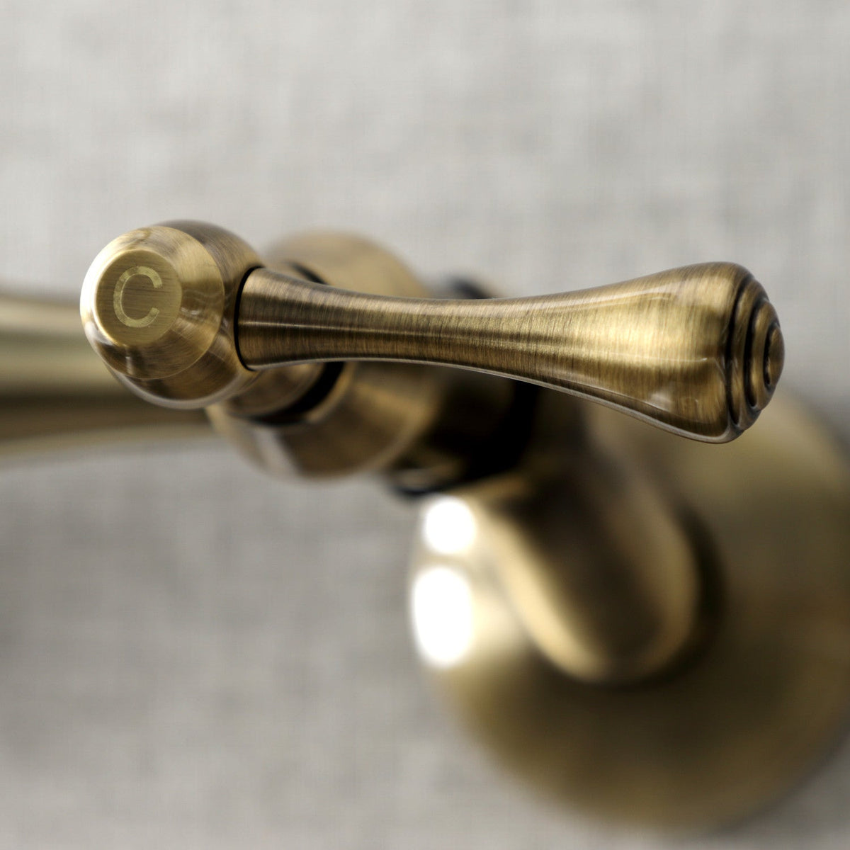 Kingston Double-Handle Wall-Mount Bridge Kitchen Faucet in Antique Brass