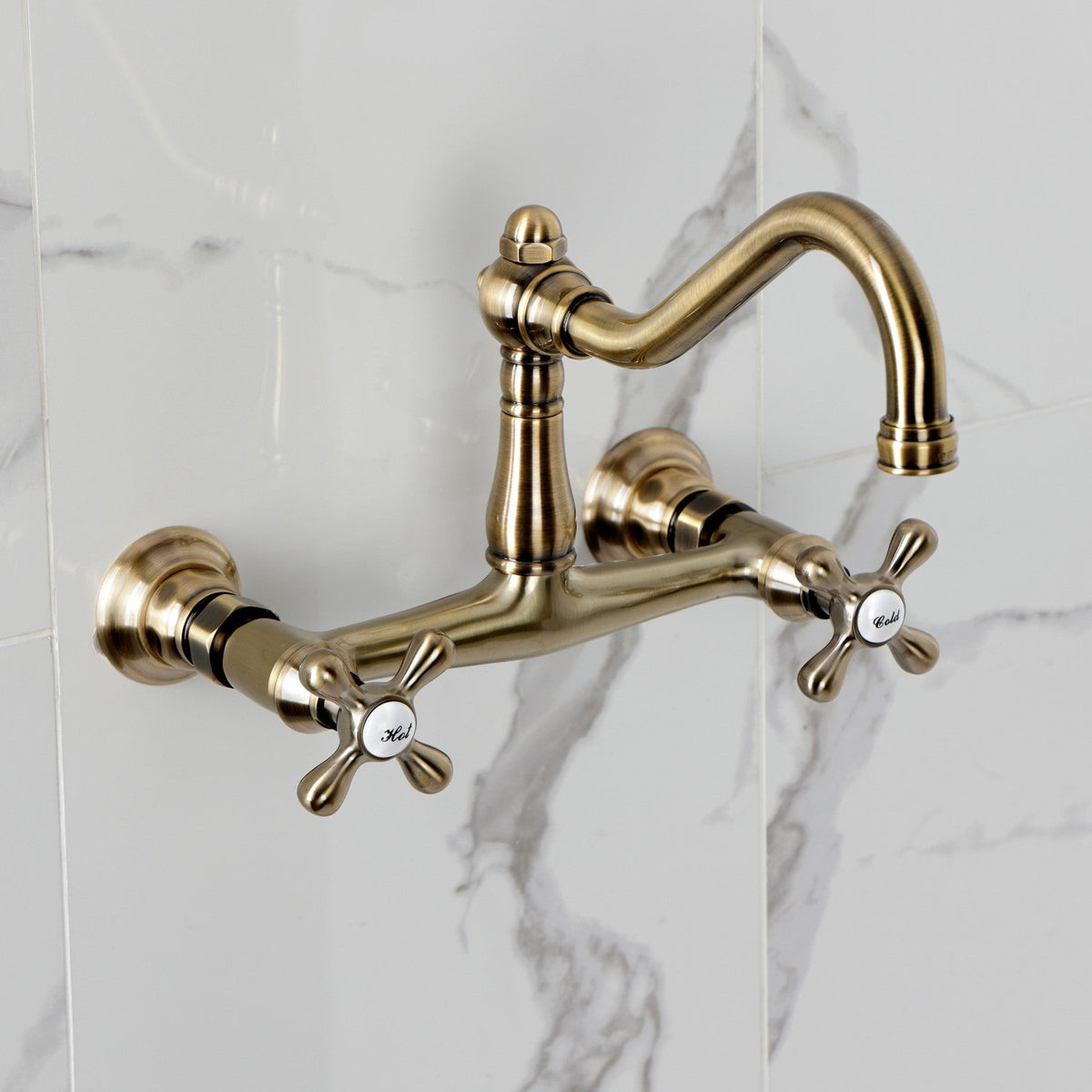 Vintage Double-Handle 2-Hole Wall Mount Bathroom Faucet in Antique Brass