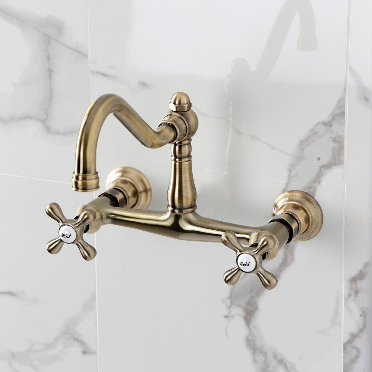 Vintage Double-Handle 2-Hole Wall Mount Bathroom Faucet in Antique Brass