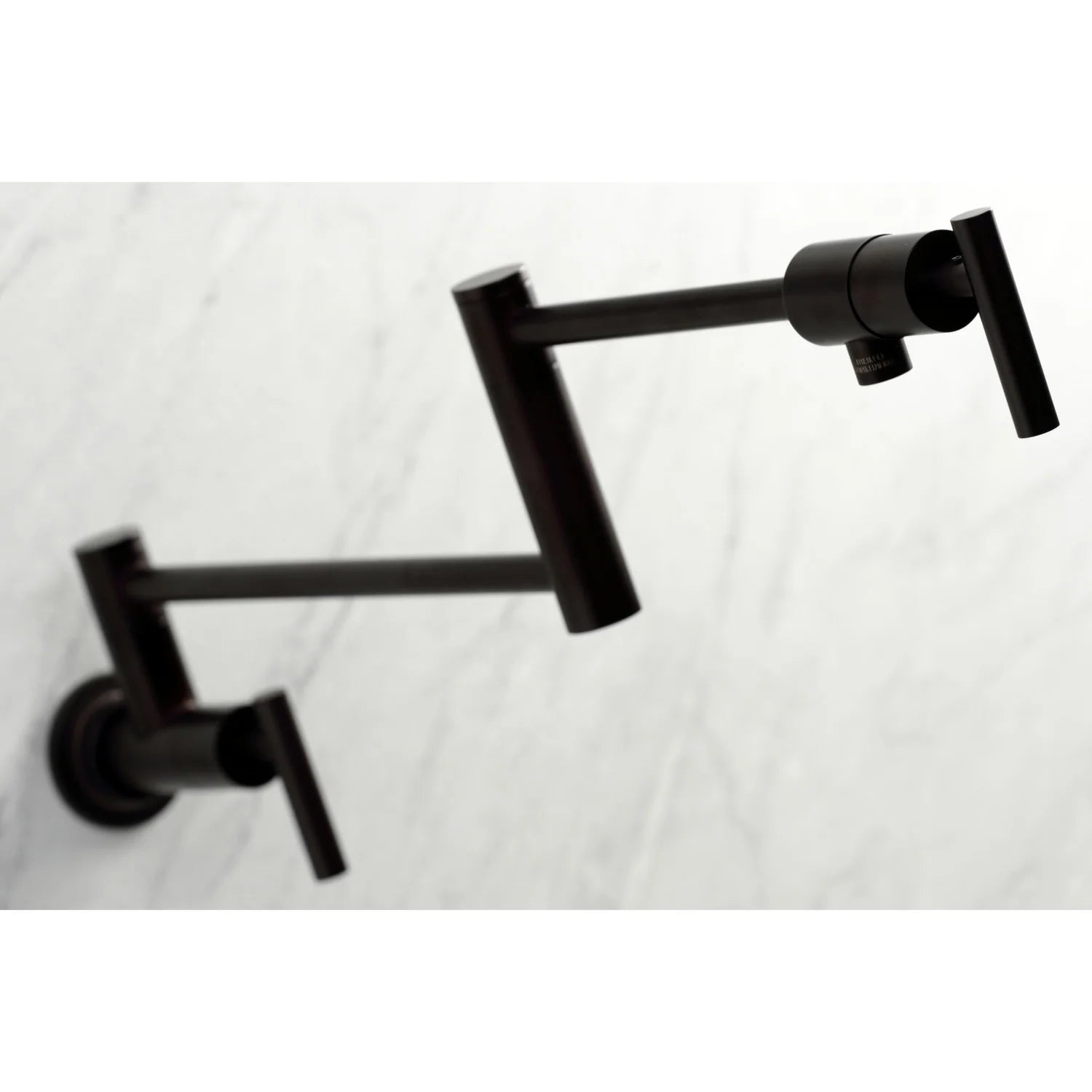 Wall-mount pot filler faucet, oil-rubbed bronze, close-up of wall valves and spout