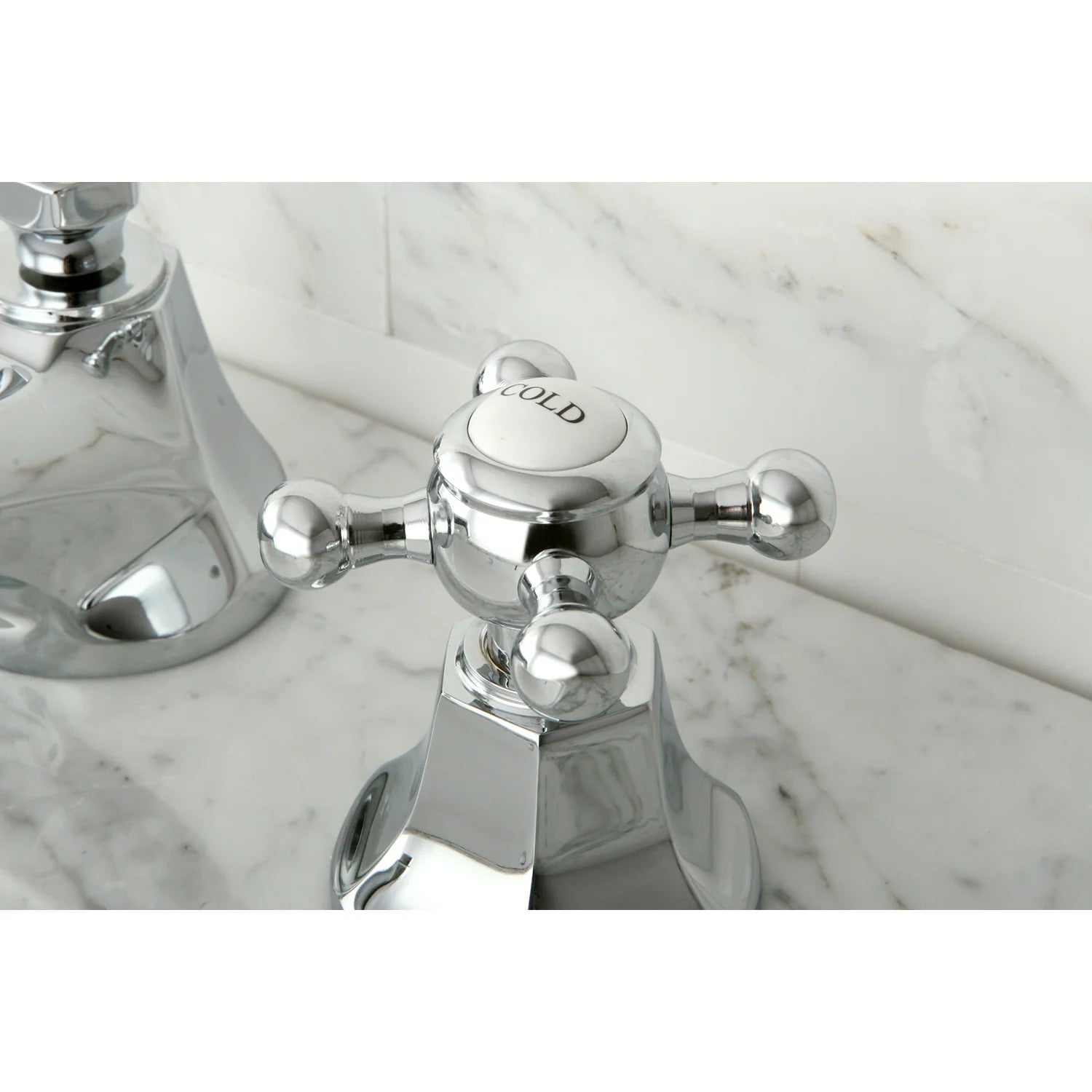 Polished chrome faucet handle with hot and cold markings on widespread base