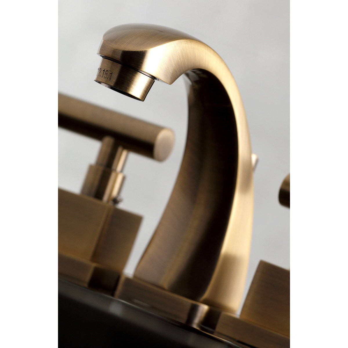 Claremont Widespread Bathroom Faucet with Brass Pop-Up in Antique Brass