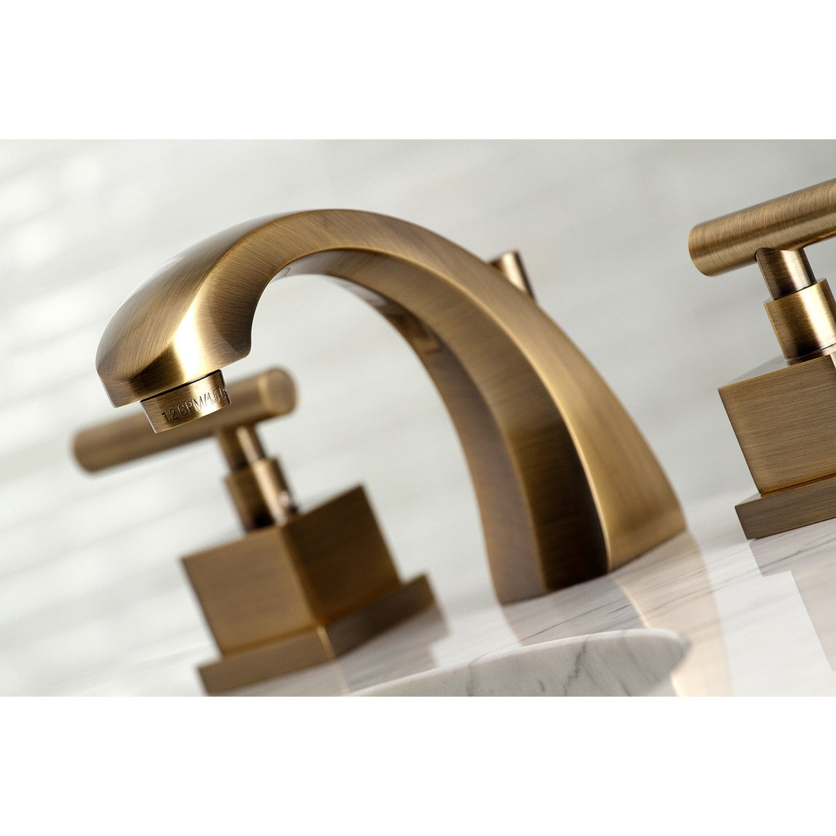 Claremont Widespread Bathroom Faucet with Brass Pop-Up in Antique Brass