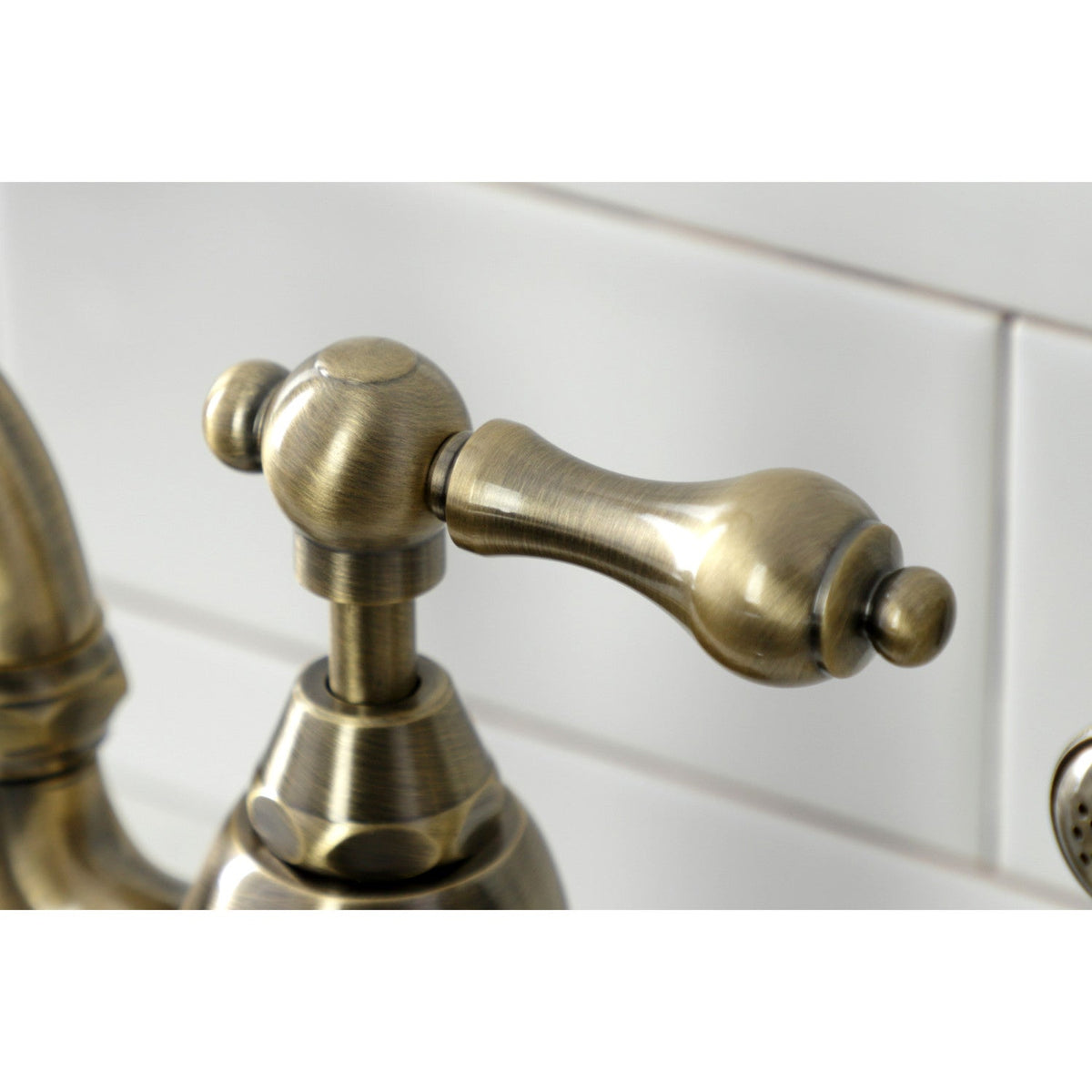 English Country Bridge Kitchen Faucet with Brass Side Sprayer in Antique Brass