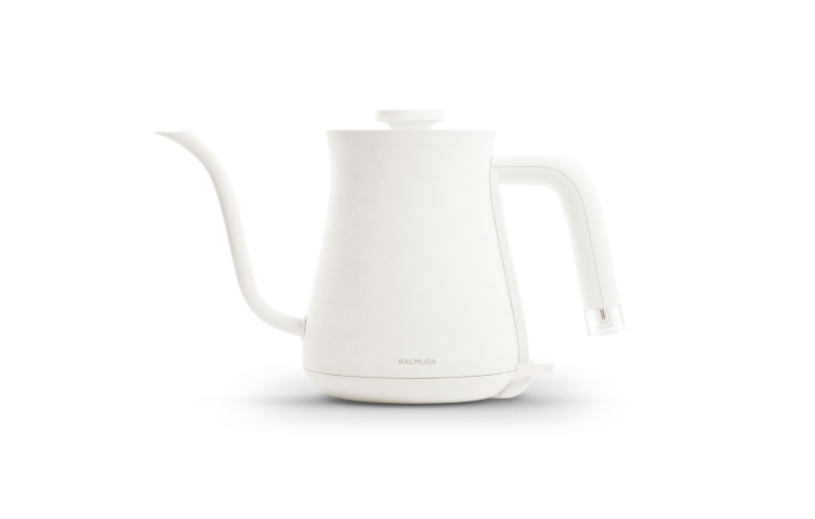 White electric gooseneck kettle with curved spout and side handle.