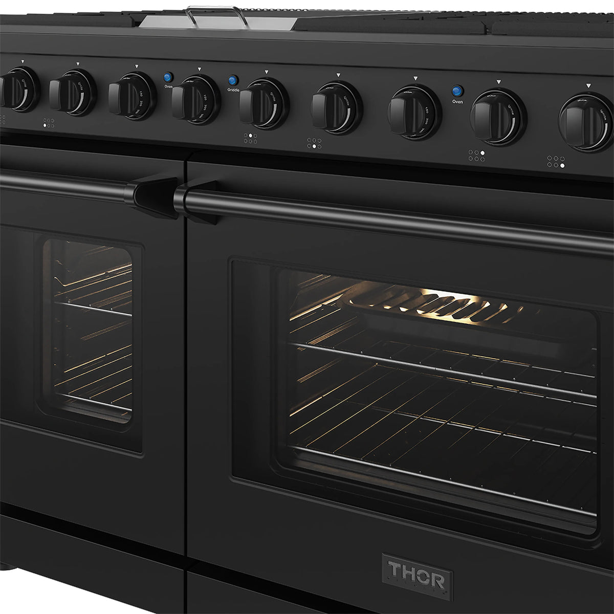 Black propane range control knobs and oven doors with glass windows
