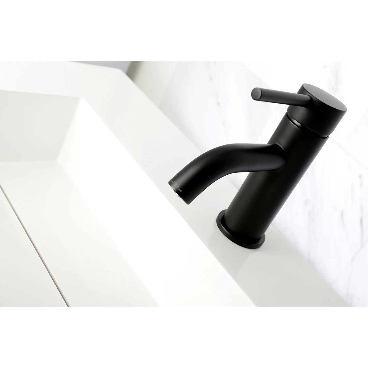 Matte black single-hole bathroom faucet with curved spout over sink