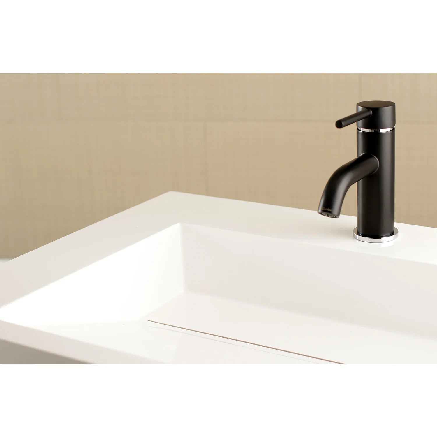 Matte black single-handle bathroom faucet mounted on white sink