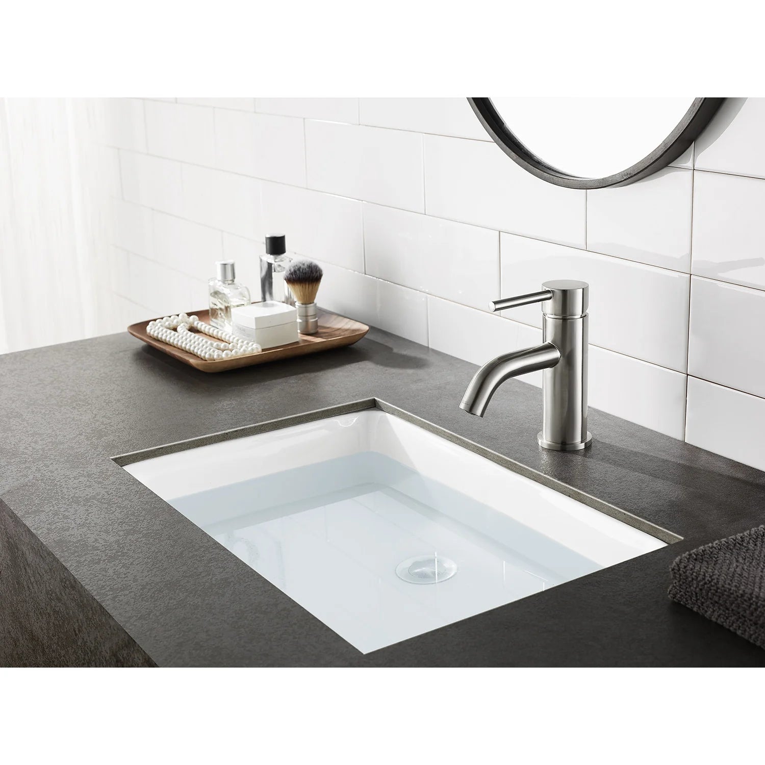Brushed nickel single-hole bathroom faucet with arched spout and one lever handle