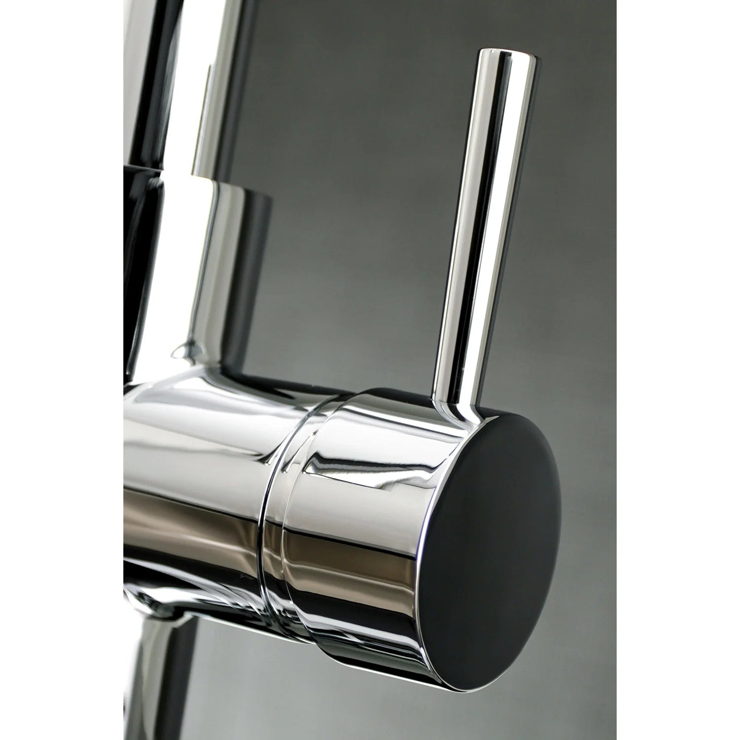 Polished chrome single-handle faucet body with cylindrical control lever and smooth finish