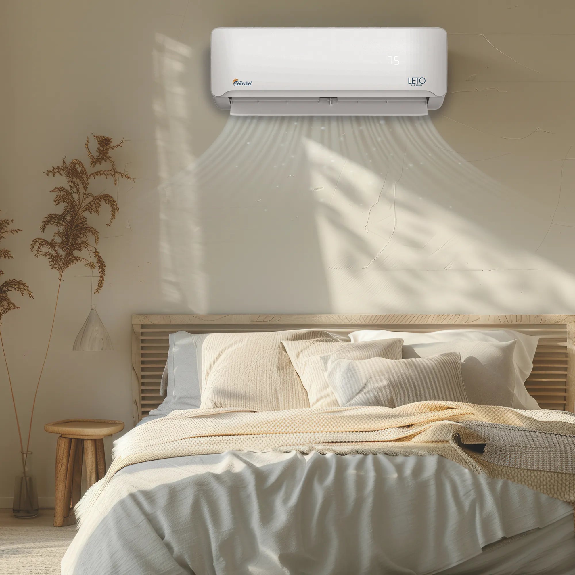 Wall-mounted mini split air conditioner, white unit emitting cool airflow from vents