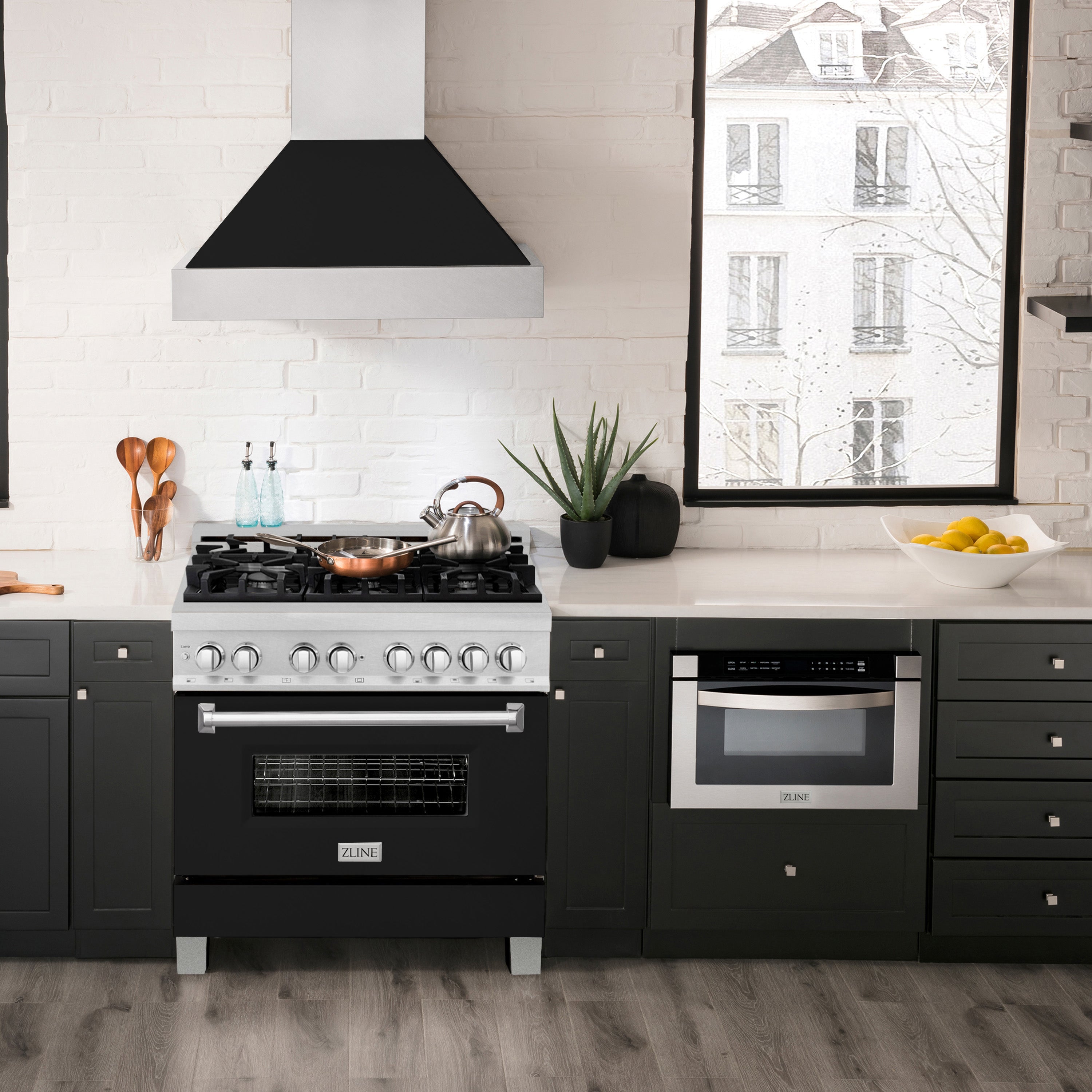 Dual fuel range with stainless top and black matte oven doors in a kitchen