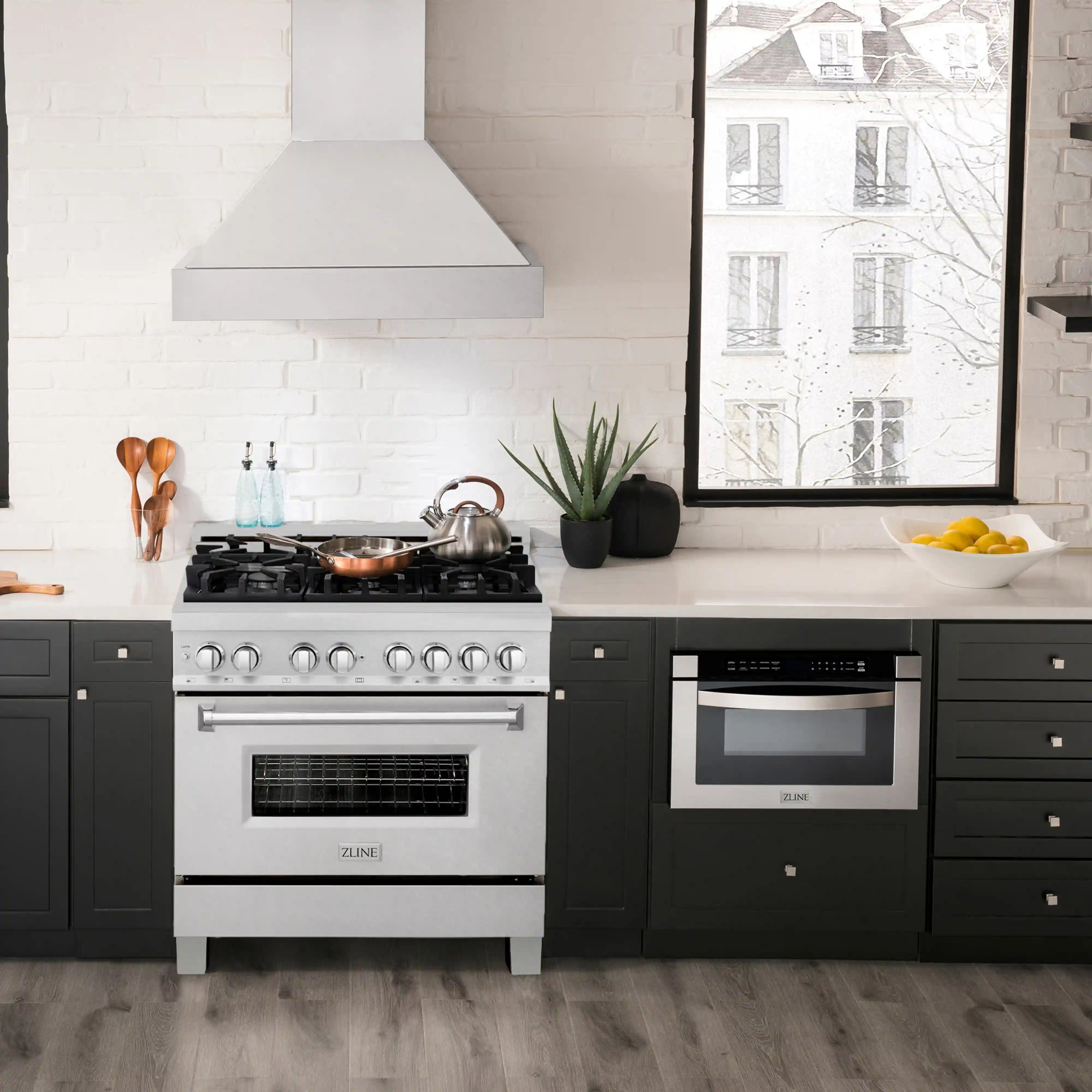 ZLINE dual fuel range in kitchen showing cooktop and oven doors